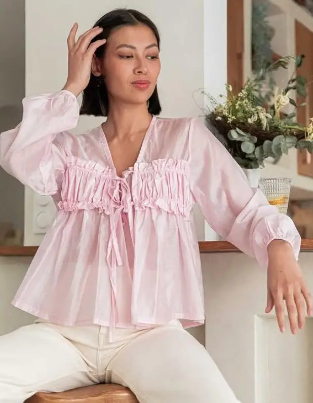 

Elevate Your Spring Style with Our Women's Button-Up Shirt in Various Colors and Sizes