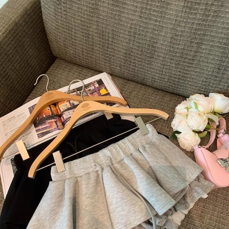 夏の新しいスパイシーガール弾性ローウエスト A ラインショートスカートグレー巾着スカート女性のための