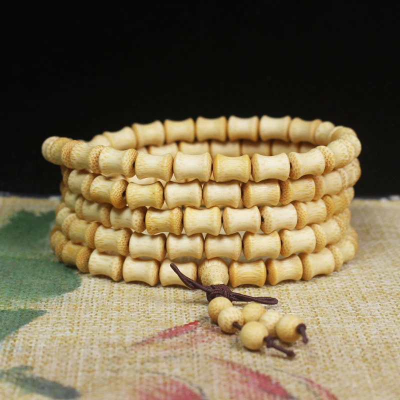 

New model golden , bamboo knot , seed pattern fish eye prayer beads bracelet