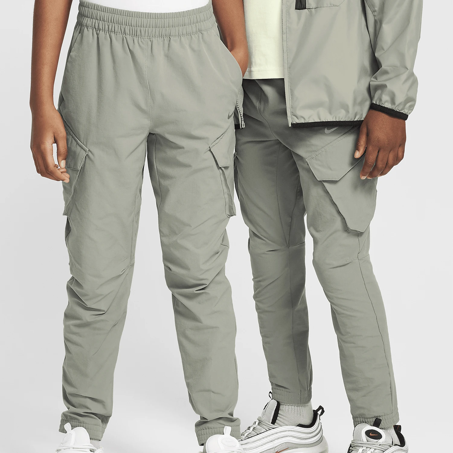 Официальные детские длинные брюки Nike Sportswear City Utility FZ4904-053