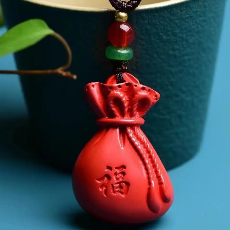 

Кулон в виде денежного мешка с красным песком, кулон