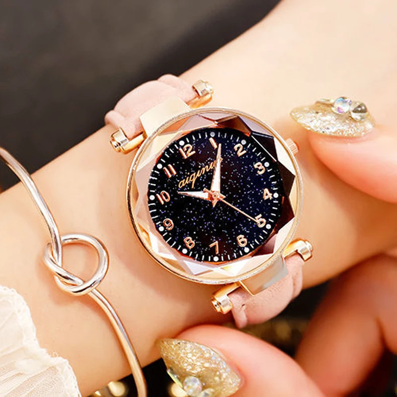 Un regalo lujoso de un reloj de mujer sencillo, estrellado, moderno, moderno y elegante.