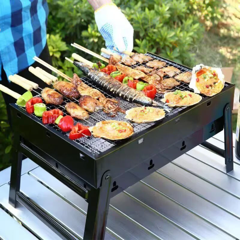 

Camp Portable Folding BBQ Grill, Compact and Lightweight Charcoal Grill, Easy To Assemble and Carry, Ideal for Outdoor Cooking