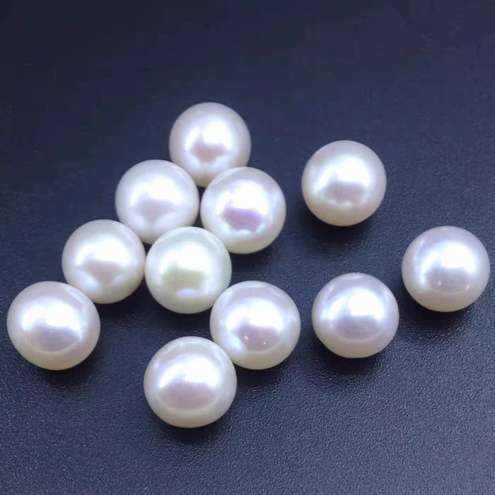 

AAAA Giant 11-12mm Natural South China Sea Real Tea White Round Bulk Pearl Half Hole