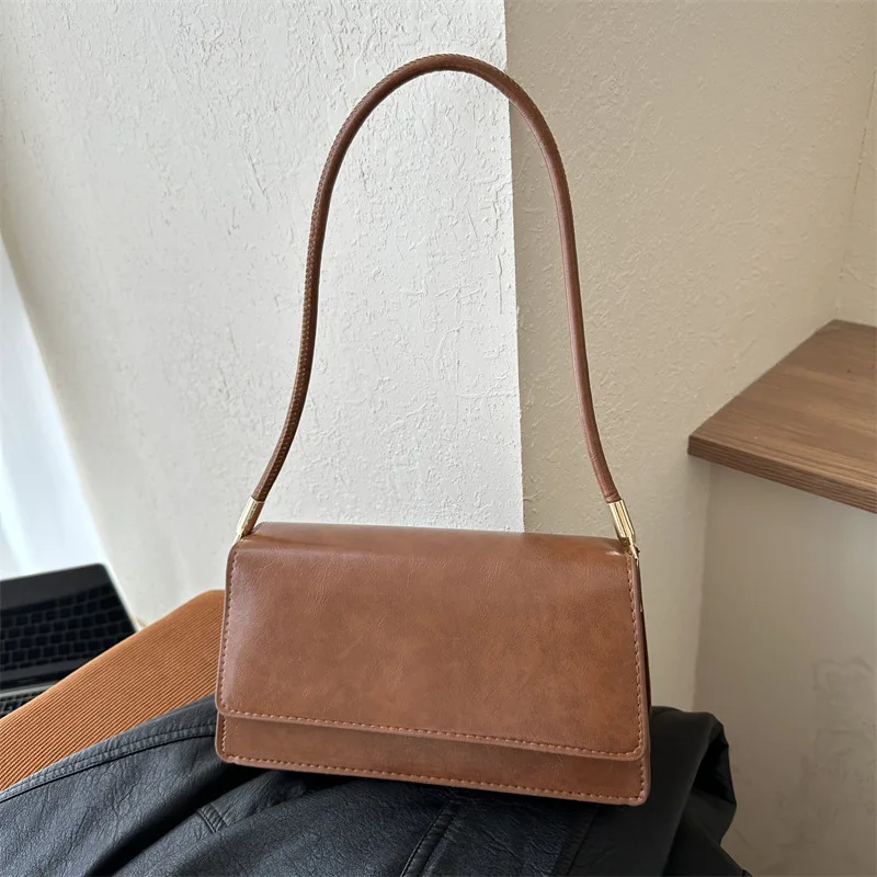 Nieuwe Dames Schoudertas Minimalistisch Niche Design Schoudertas Crossbody Tas High-End Aanvoelende Luxe Oksel Stick Schoudertas