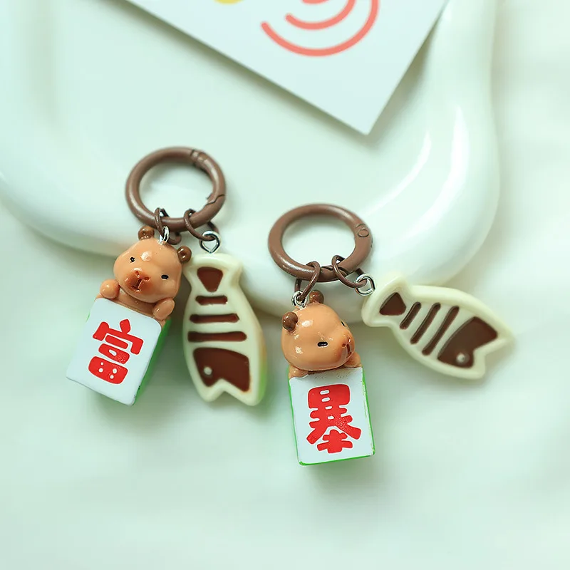 

1PCSrCapibaa Capybara 2025 car pendant girls cute creative car keychain resin hanging ornaments