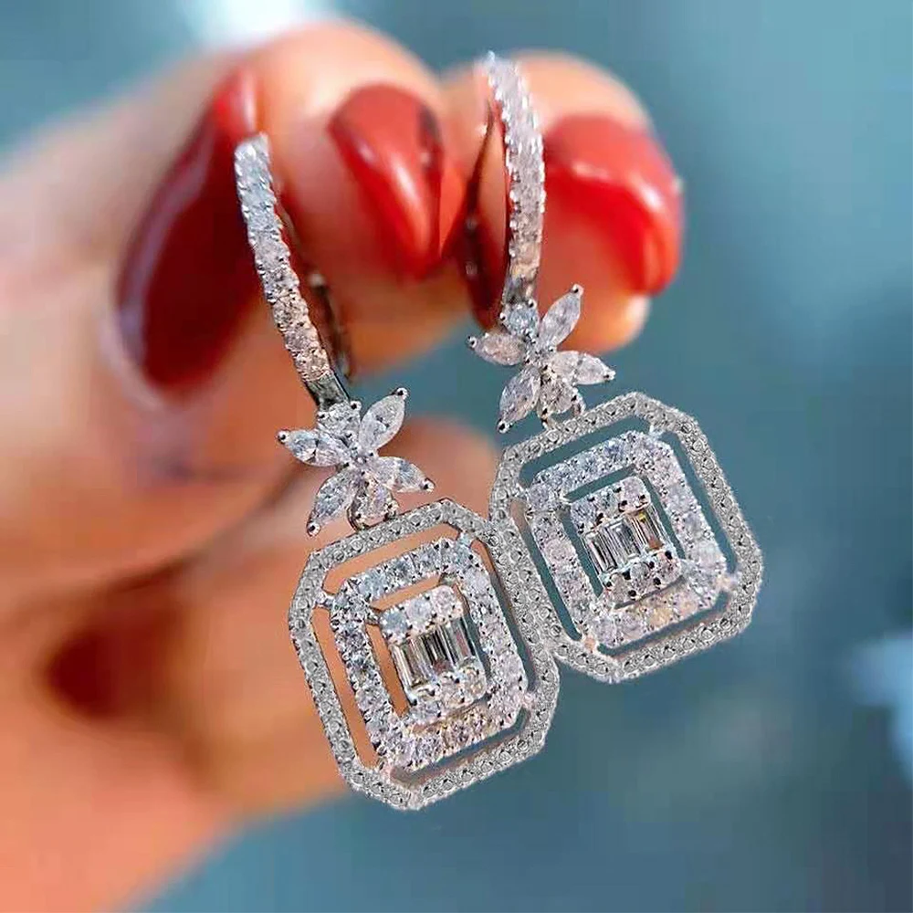 

Huitan Fancy Bride Dangle Earrings Silver Color Flower Design Luxury Cubic Zirconia Earrings Fashion Jewelry for Women Nice Gift
