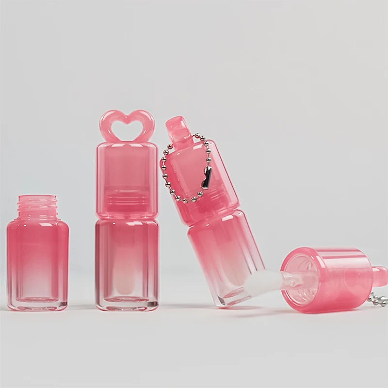 Herzform, hohl, Farbverlauf, Lipgloss-Röhren, großer Zauberstab, Pinsel, Lippenöl-Flaschen, leere Lipgloss-Röhre, Lippenstift-Flaschen, Behälter