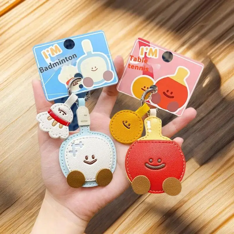 Niedlicher Cartoon-Leder-Schläger-Anhänger Schlüsselanhänger Kawaii Simulierter Badminton Tischtennis Rucksack-Dekoration Zubehör