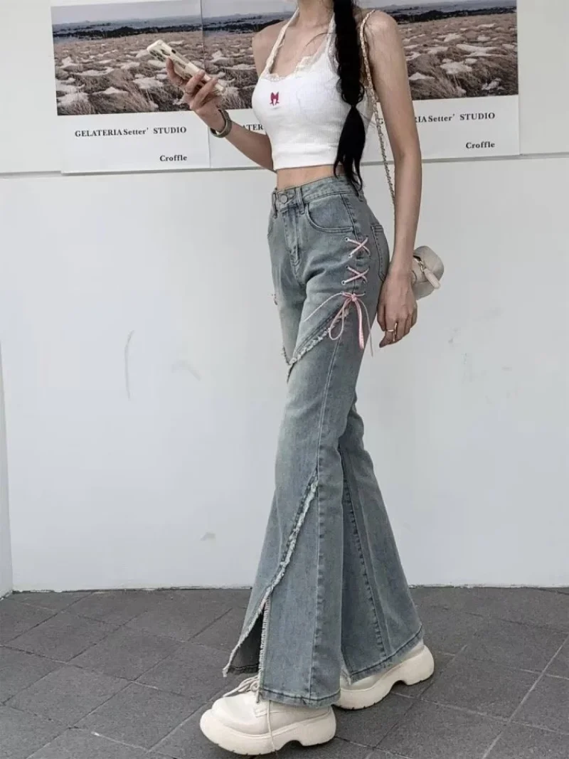 Ropa de cintura alta con cremallera para mujer, pantalones sueltos Retro femeninos con borlas, pantalones Micro acampanados, ribete deshilachado, ropa de calle con agujeros, pantalones vaqueros de mezclilla