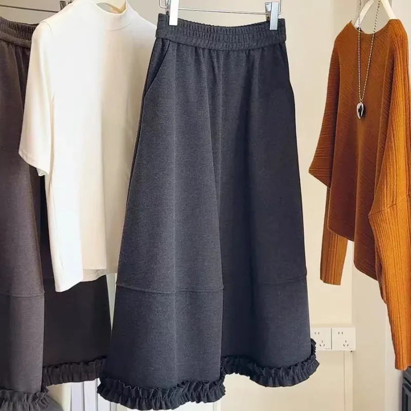 تنورة صوفية بلون واحد تناسب الجميع للنساء لخريف وشتاء جديد عالي الخصر فضفاض مناسب للتخسيس على شكل حرف a تنورة متأرجحة كبيرة #1
