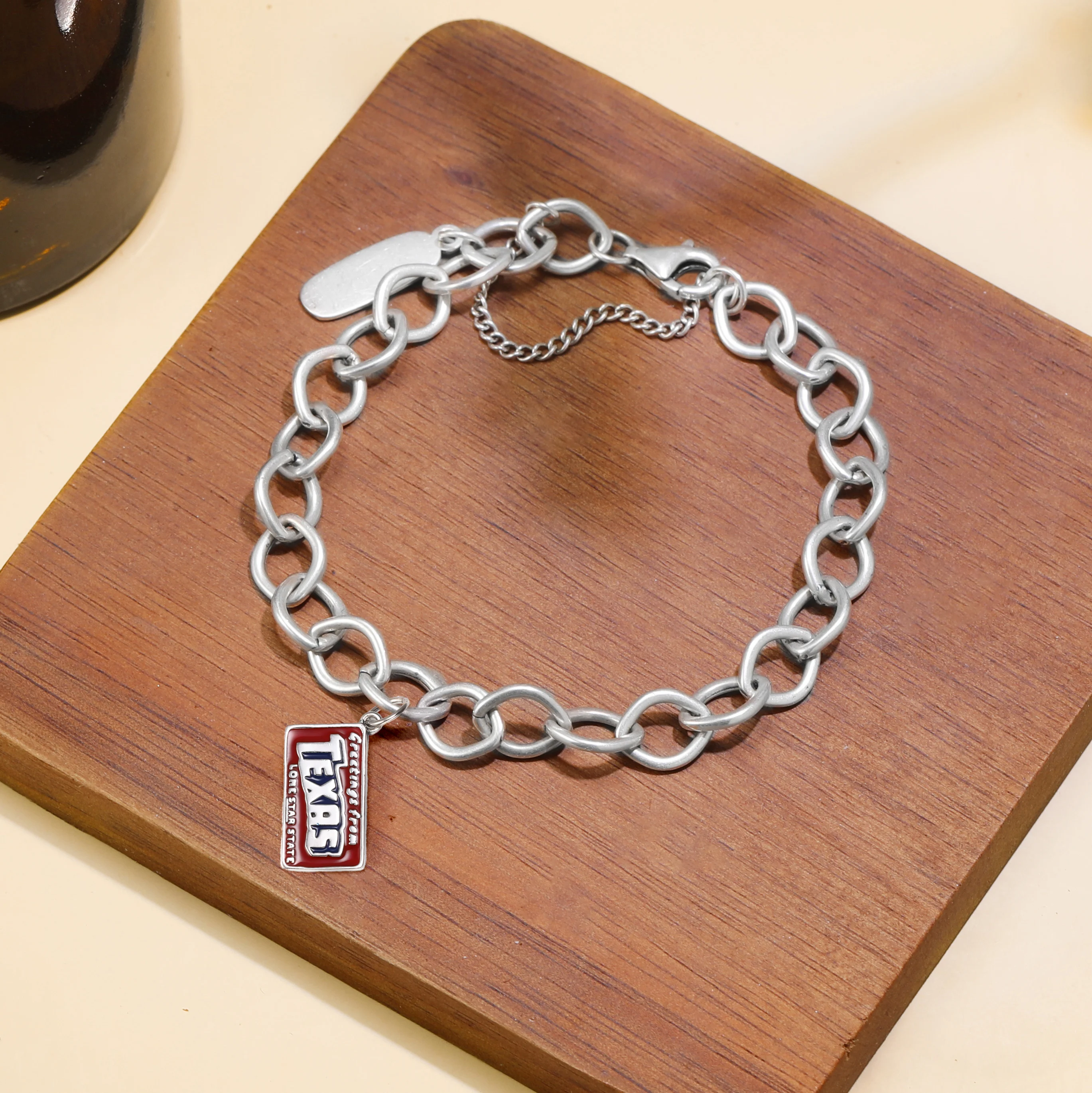 

Genuine 925 sterling silver Forged Link Charm Bracelet paired with colored Greetings from Dezhou pendant