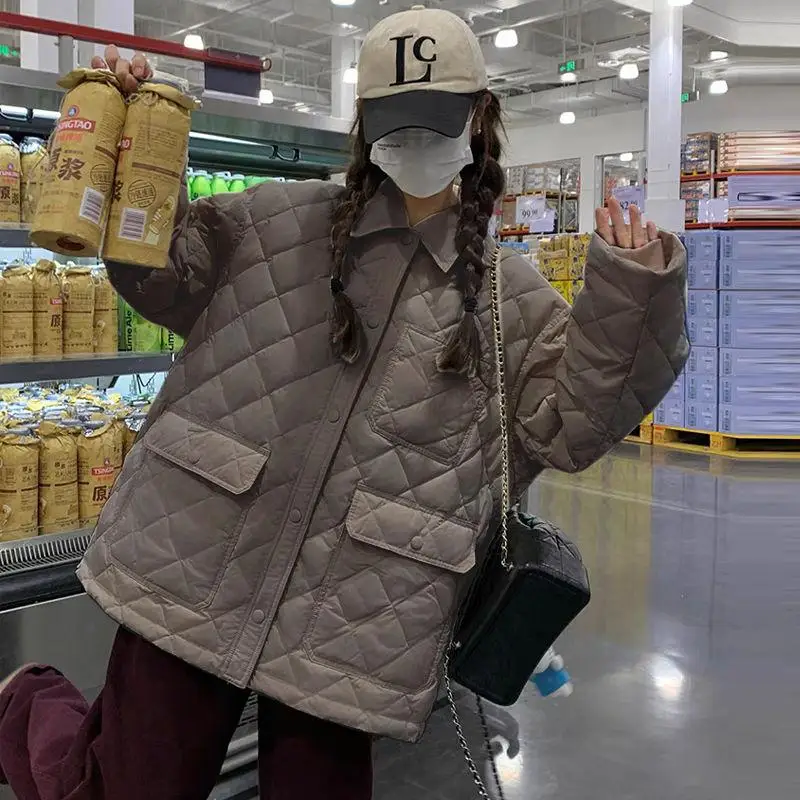 

Легкая женская зимняя куртка из пуха, новая модель в корейском стиле, с воротником-стойкой, на одной пуговице, повседневная, с защитой от...