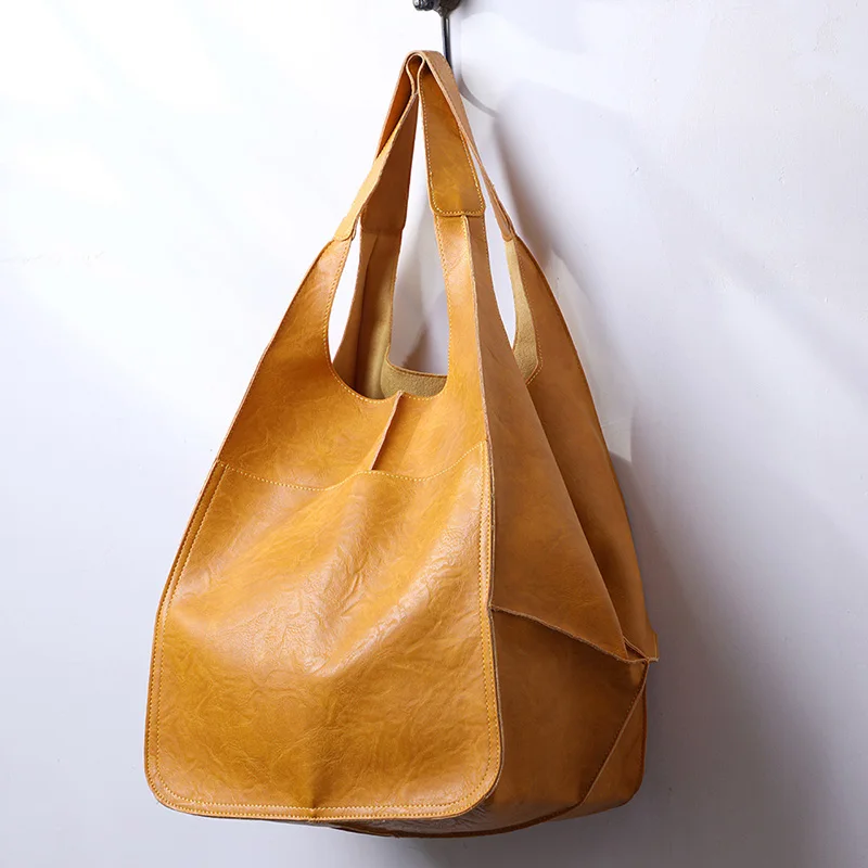 Bolso de mano de cuero PU para mujer, bolsa de hombro suave de gran capacidad, Simple, a la moda, Retro, Color sólido, nuevo