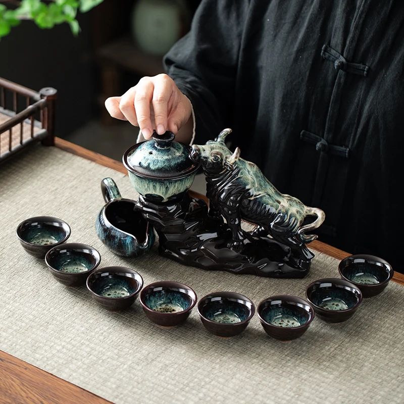 1 set of creative lazy tea set, semi-automatic cow teapot, magnetic rotating water guide, Chinese Kung Fu tea set