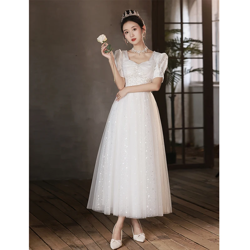 فساتين سهرة بيضاء للنساء أنيقة بياقة مربعة وأكمام منتفخة مزينة بالترتر مطرز بالخرز مأدبة مزاجه فساتين حفلات الزفاف