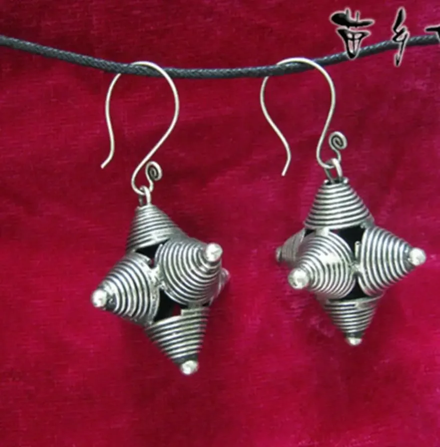 

Ethnic style handmade Miao silver earrings personalized versatile short six-sided nail earrings