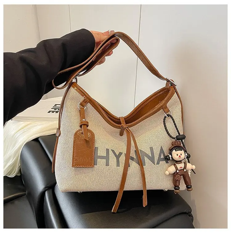 

2025 Summer Canvas Tote Bag Fashion Shoulder Crossbody Purse Minimalist Commuter Bag for Women Men Trendy Retro Casual