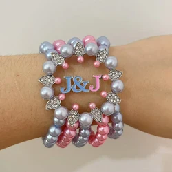 Jack and Jill of America 5-tier beaded light pink and light blue elastic bracelet