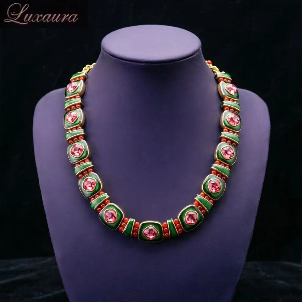 

Vintage jewelry featuring a fashionable and classic red geometric necklace design paired with Bohemian style women's necklace