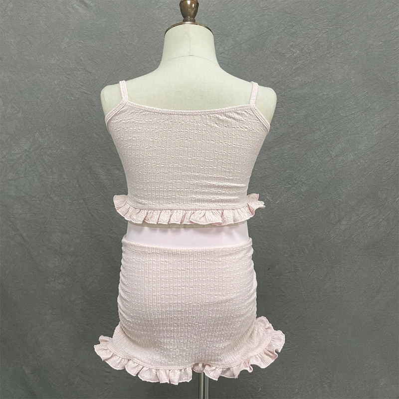 2025 ฤดูร้อนใหม่ชุดเต้นรําละตินเด็กสีชมพูแขนกุดชุดสาว Samba สวมใส่การฝึกอบรมเสื้อผ้า XH2585