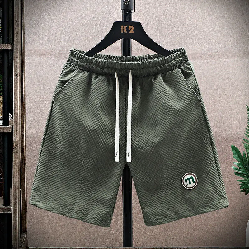 

Ice Silk Casual orts Men's Summer 2025 New Trend Qui Dry Sports Loose Versatile Beach Five-Quarter Mid-Pants Breathable