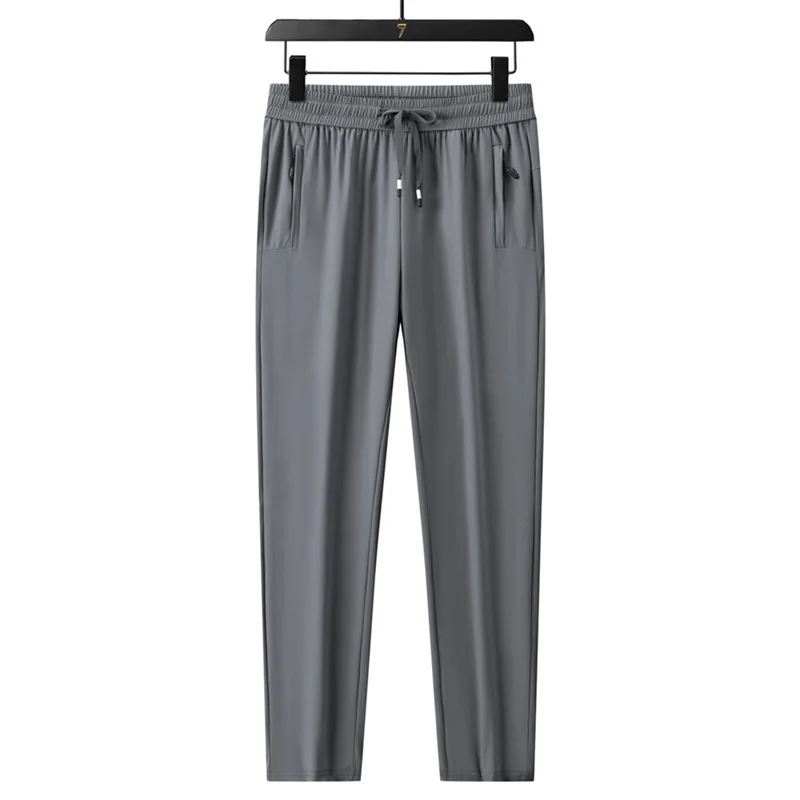 Pantalones casuales finos de seda helada, de secado rápido y frescos tanto para hombres como para mujeres, con material elástico para ropa deportiva relajada