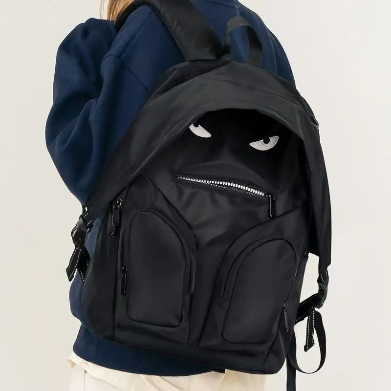 

Cartoon Cute Black Demon Backpack Women Commuter Lightweight Large Capacity Schoolbag Men Travel Casual Multifunctional Backpack