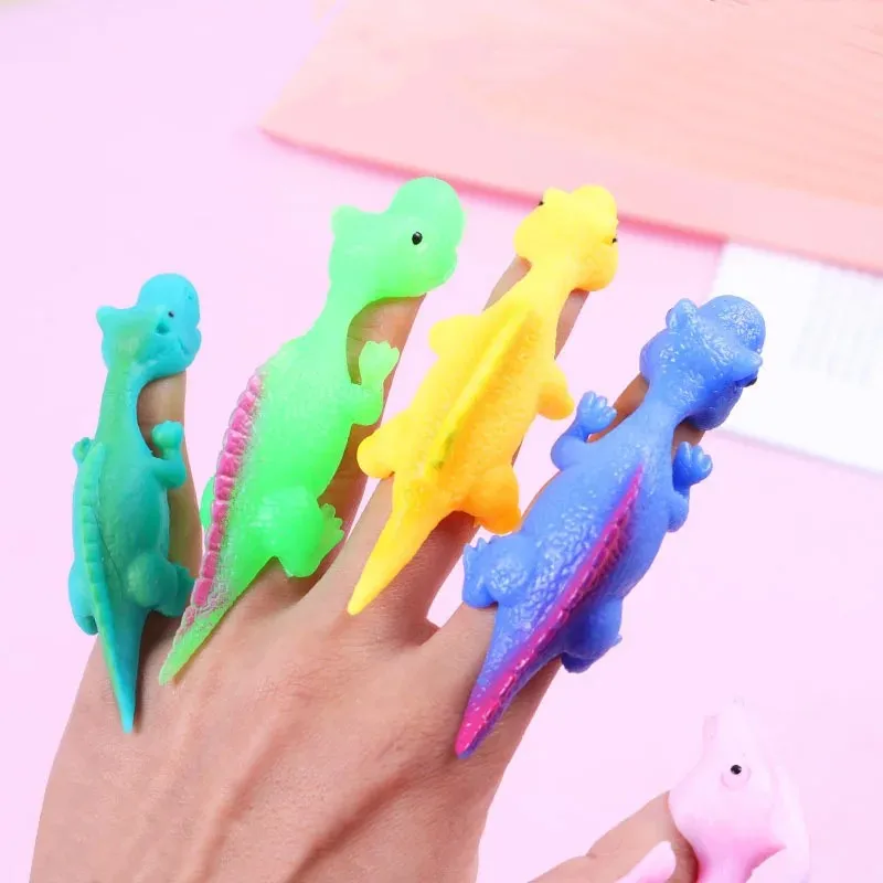 1PC Creative Dinosaur Finger Toys Kids Funny Cartoon Animals Anxiety Stress Relief Shooting Playing Toy Slingshot Catapult Game