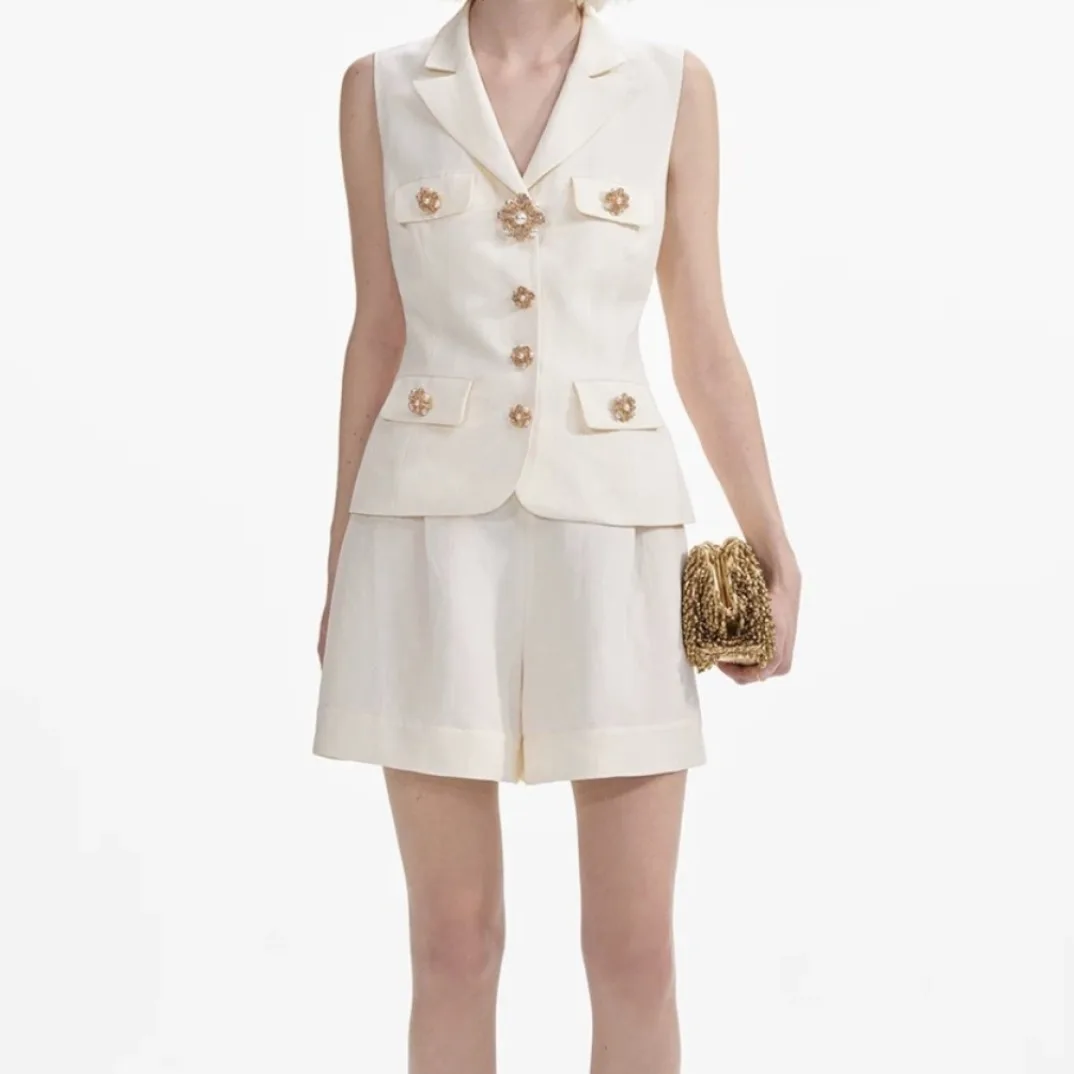 

2025 New High Quality Autumn White Sleeveless Turn Down Collar Mini Jumpsuit for Women