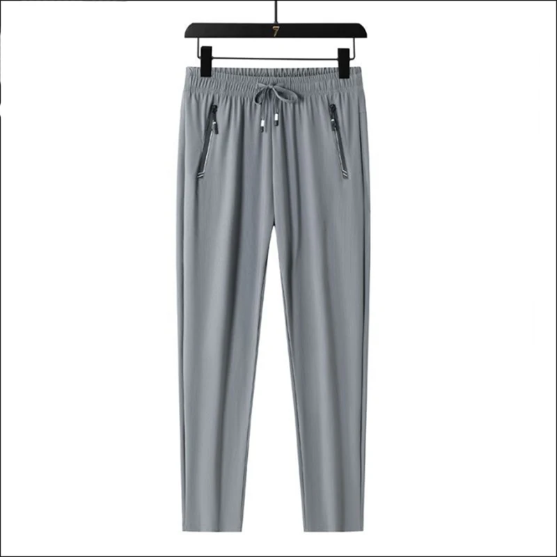 Wiosenne letnie męskie sznurowane spodnie dresowe Homme w pasie legginsy na wszystkie mecze sportowe spodnie męskie wygodne proste spodnie