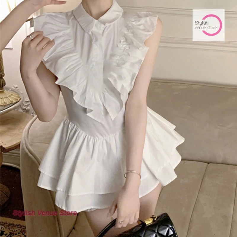 Conception française sens douce épicée fille chemise à volants robe femme été nouveau tempérament doux petites manches volantes taille jupe.
