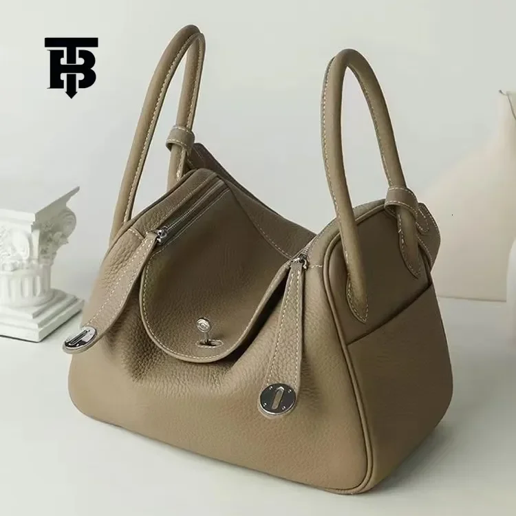 

Женская сумка D 2025: Роскошная сумка-тоут из натуральной кожи с узором «Личи», модель Lindy, на одно плечо, в форме аптечки