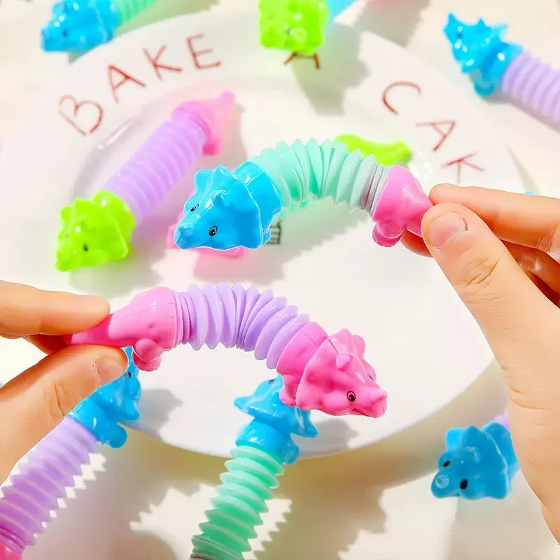 10pcs צבעוני דינוזאור פופ צינורות טלסקופי פידג 'ט צעצועים ילדים מסיבת יום הולדת מעדיף קרנבל מזכרות קרנבל