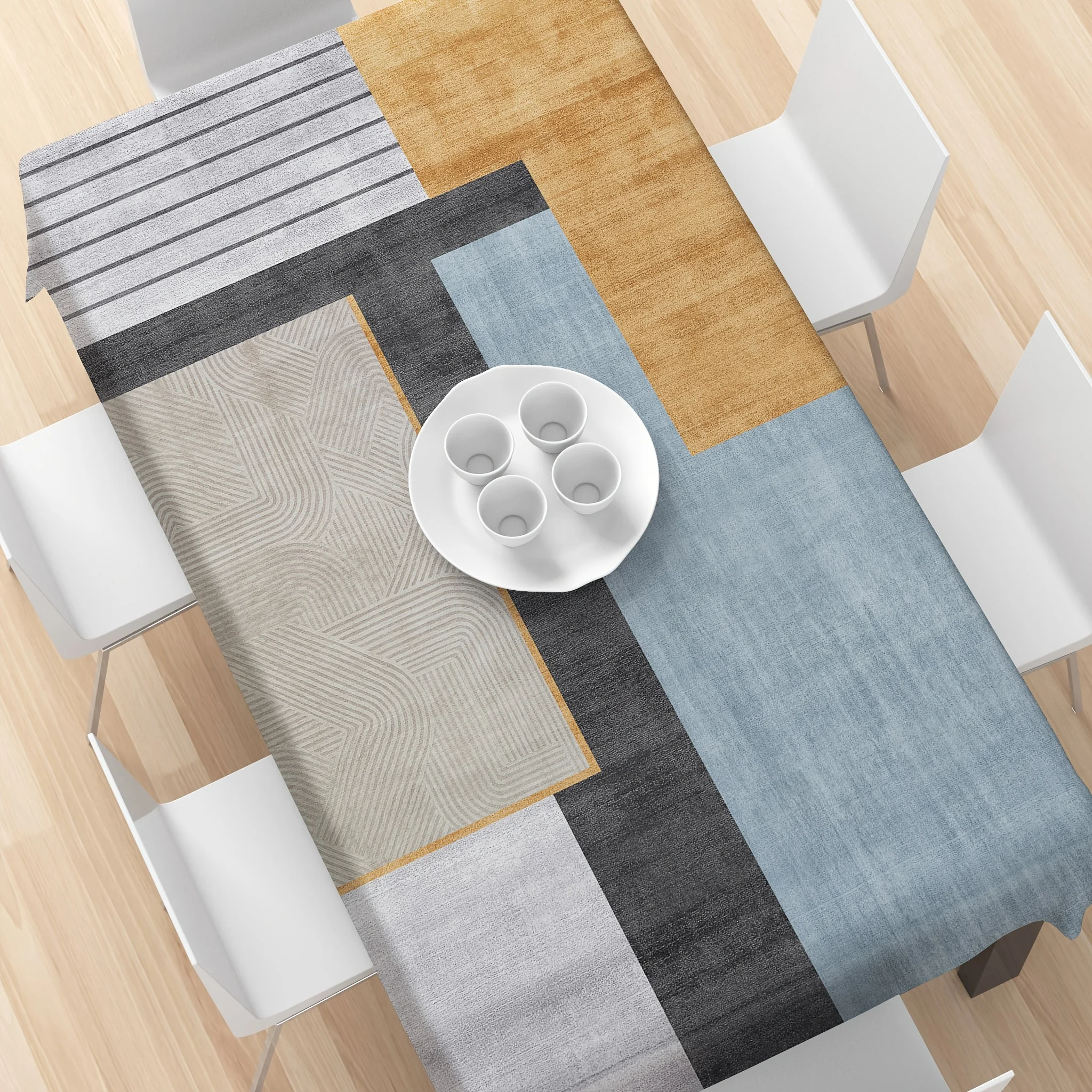 One rectangular tablecloth, with Bauhaus theme and abstract geometric pattern, creating a vibrant dining table setting
