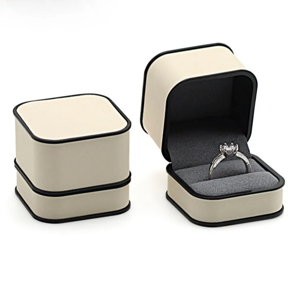 

Fashion High-end Ring Box Velvet-lined PU Jewelry Box Round Corner Black Frame Design Beige Earring Box