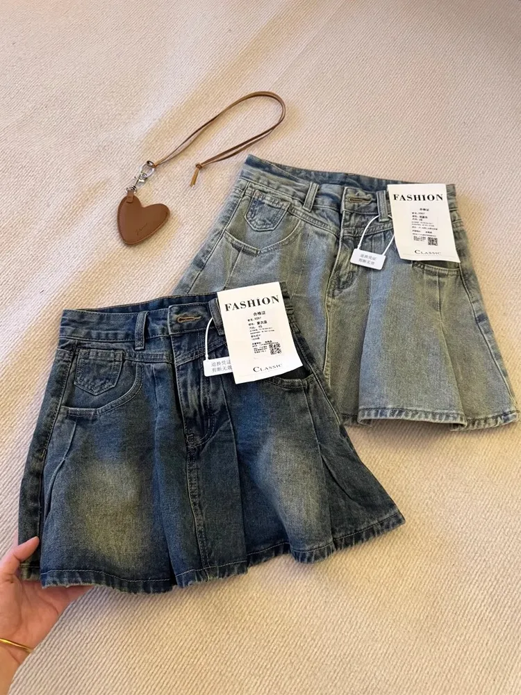 

Сексуальная ретро американская джинсовая плиссированная юбка с высокой талией для похудения, предотвращающая воздействия юбка трапециевидной формы для женщин, летняя новинка Sle