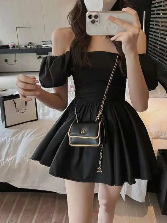 Internet celebrity new two in one shoulder black bubble sleeved dress for women in summer with a slim waist and sweet style PQRI