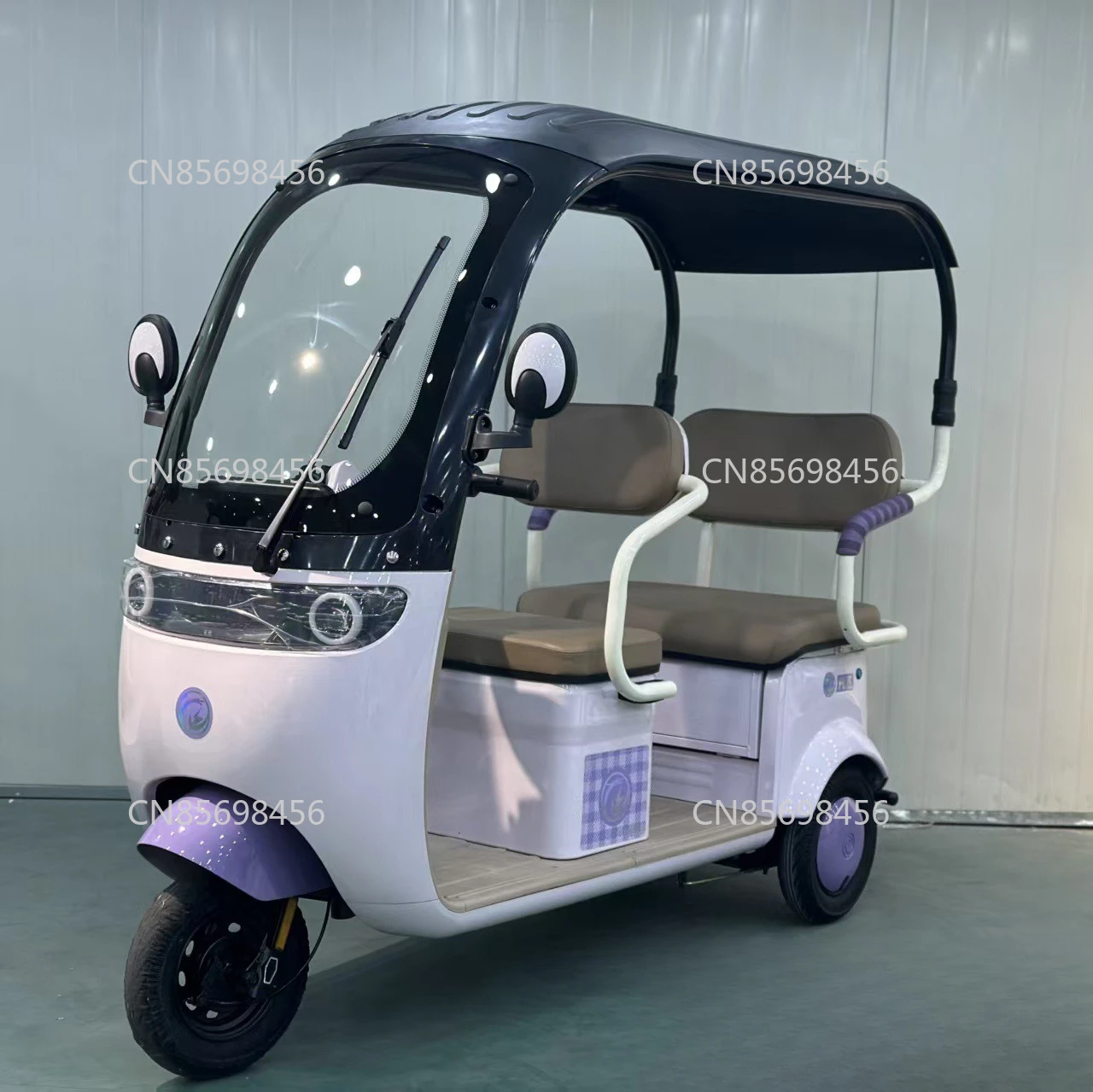 

Integrated shed electric tricycle double-row seat passenger and cargo dual-purpose daily leisure travel