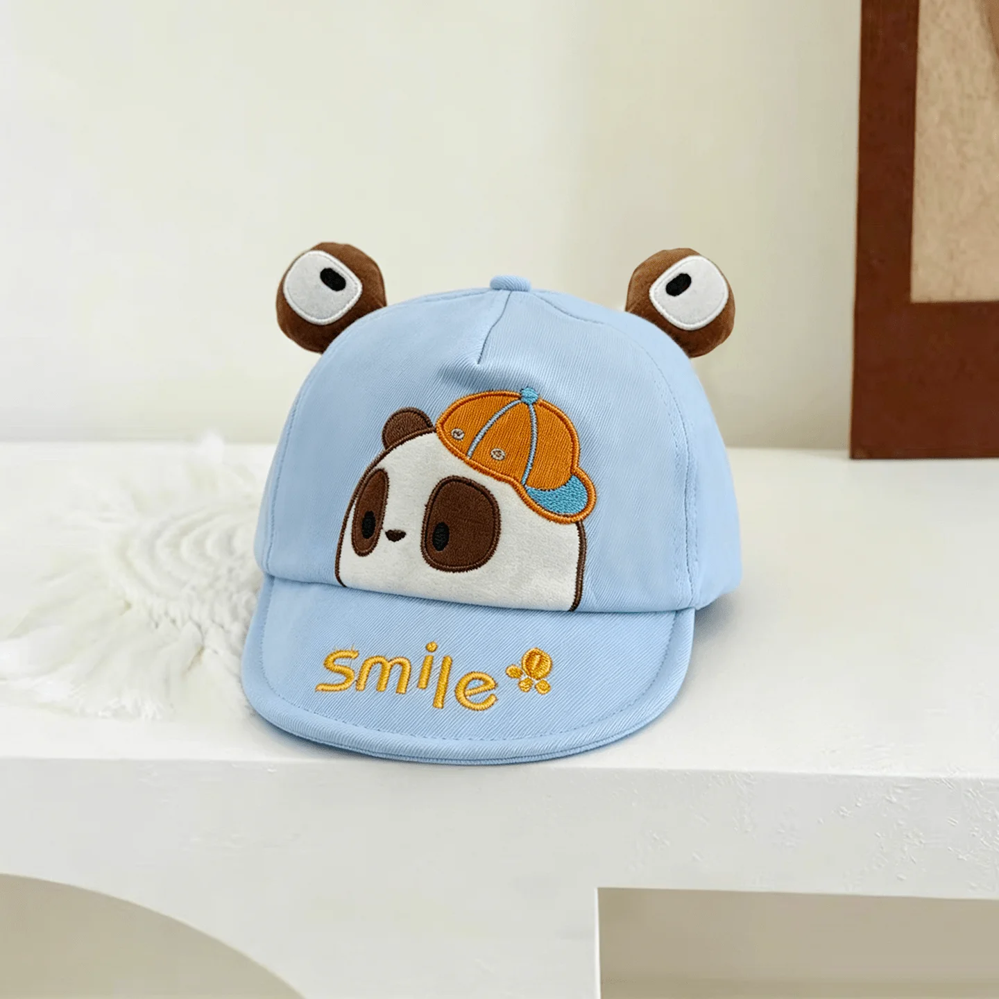 

Three-dimensional big-eyed panda baby soft brimmed baseball cap made of cotton, fashionable and versatile for babies