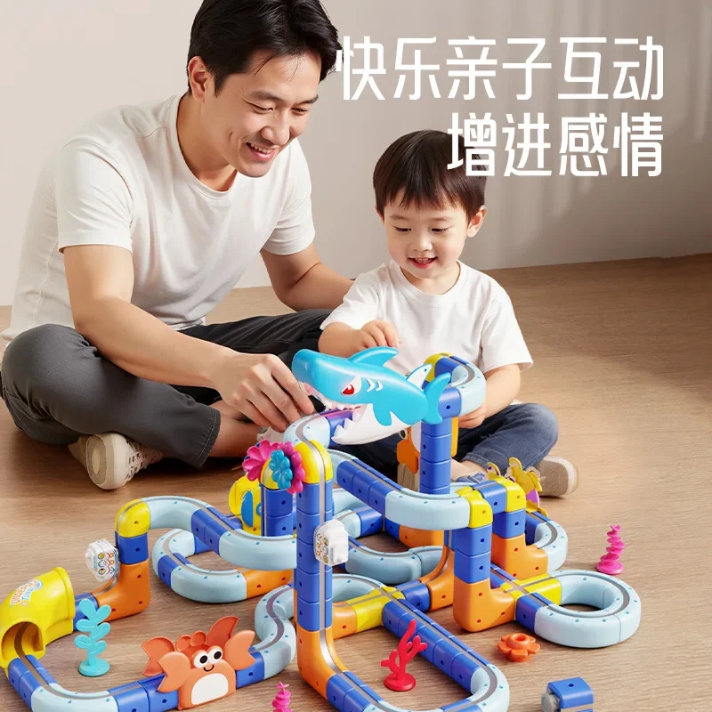 

Shark-Themed Electric 3D Magnetic Track High-Speed Train Model - DIY Building Blocks Toy for Boys & Kids | Perfect Kids Gift