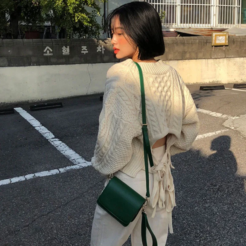 Pull court à col en v, personnalité de tempérament ludique et sexy, sens du design à la mode, pull à lacets à la taille pour dames