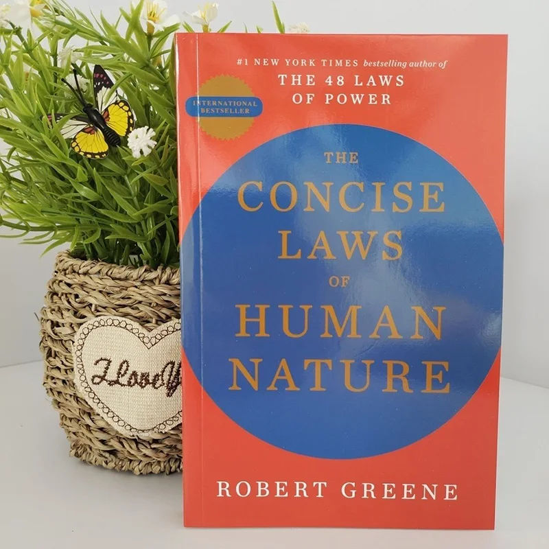 

The Concise Laws of Human Nature Книга-бестселлер в мягкой обложке Роберта Грина на английском языке Libros Livros