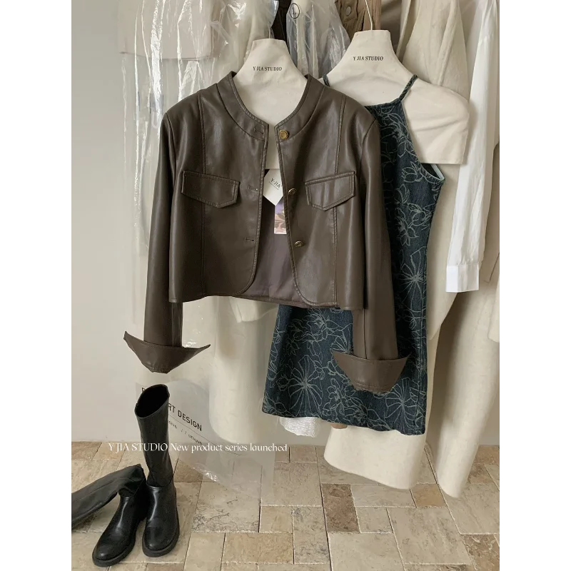 Giacca corta in pelle PU allentata alla moda e popolare con colletto alla coreana per moto retrò