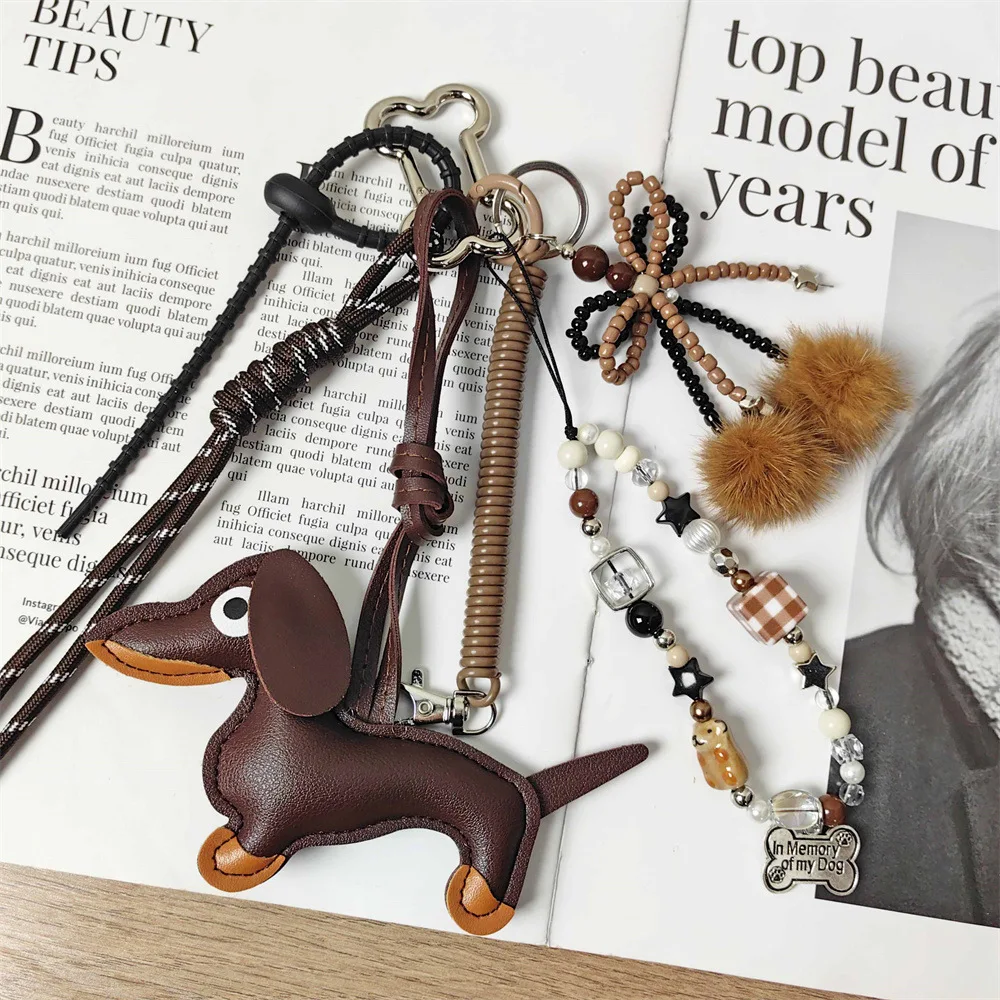 Handmade baseball personality keychain Creative simple soda bread fringe trend accessories Dachshund dog bow hairball bag pendan