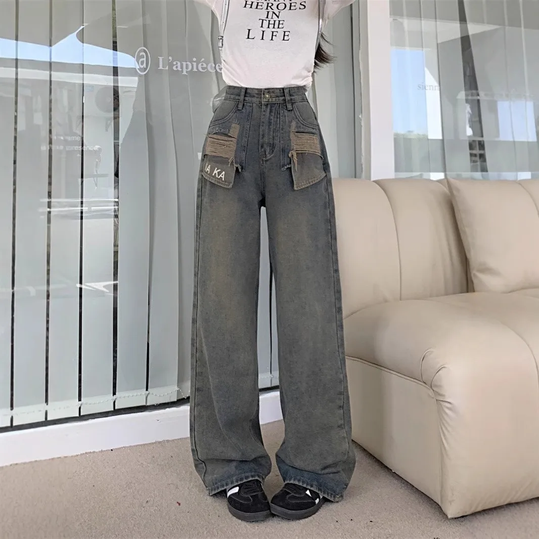 

Джинсы с дырками в стиле ретро, женские асимметричные джинсы с высокой талией, дизайн 2025 года, утягивающие универсальные широкие брюки длиной до пола