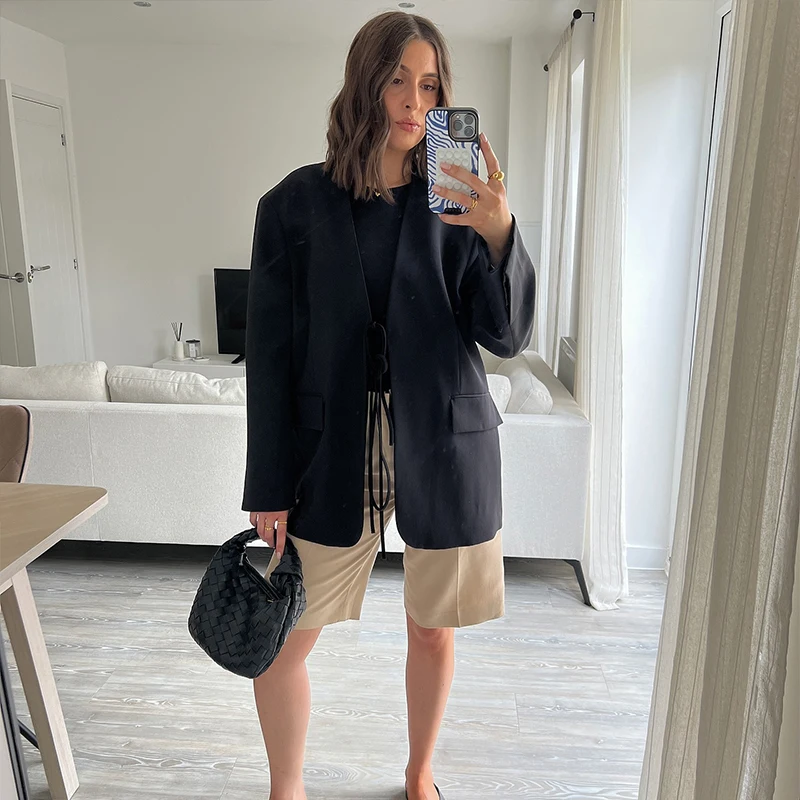 سترة أنيقة للنساء موضة كبيرة الحجم بأربطة عميقة على شكل حرف v وأكمام طويلة سترات بدلة ربيع جديد 2025 معطف فضفاض غير رسمي للمكتب للسيدات