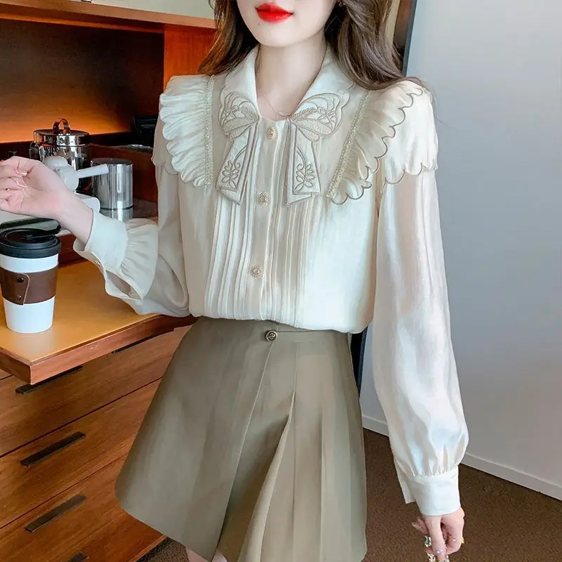 Elegant Peter Pan Collar Embroidery Folds Ruffles Shirts Women\'s Clothing 2023 Autumn Winter New Korean Tops Office Lady Blouses