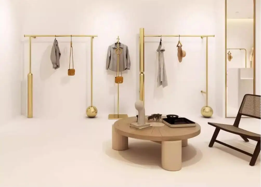 

Clothing store display shelves, wall mounted women's clothing display shelves, gold iron hanging hangers