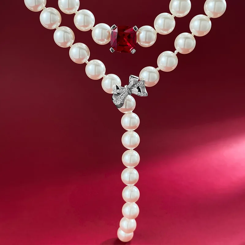 

S925 Silver Dove Blood Ruby 10 * 10mm Bow Pearl Necklace Female Adjustable Wholesale